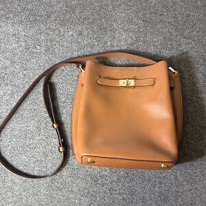 Michael Kors‎ Brown Leather Bucket Shoulder Bag w/ Turnlock 
detail